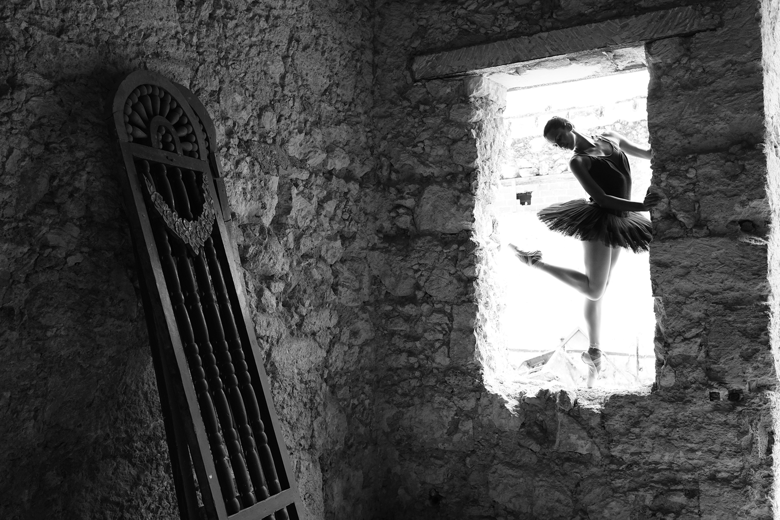 home A ballerina poses gracefully for the camera in an unusual setting